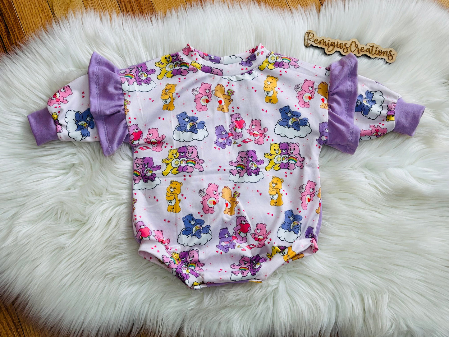 RTS 6-9 Ruffle Sweater Romper (runs big)