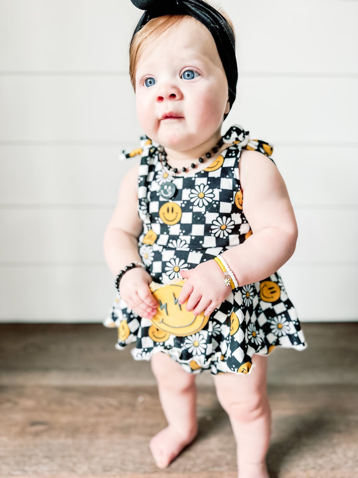 Checker Smile Camellia Tie Strap Skirted Bubble Romper